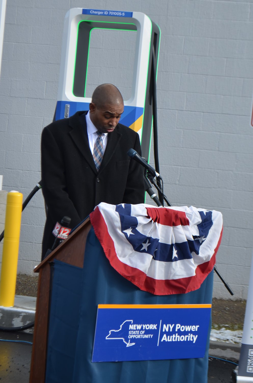 Lieutenant Governor Antonio Delgado speaks at the ribboncutting of Hancock's new EVolve NY electric vehicle charging stations.